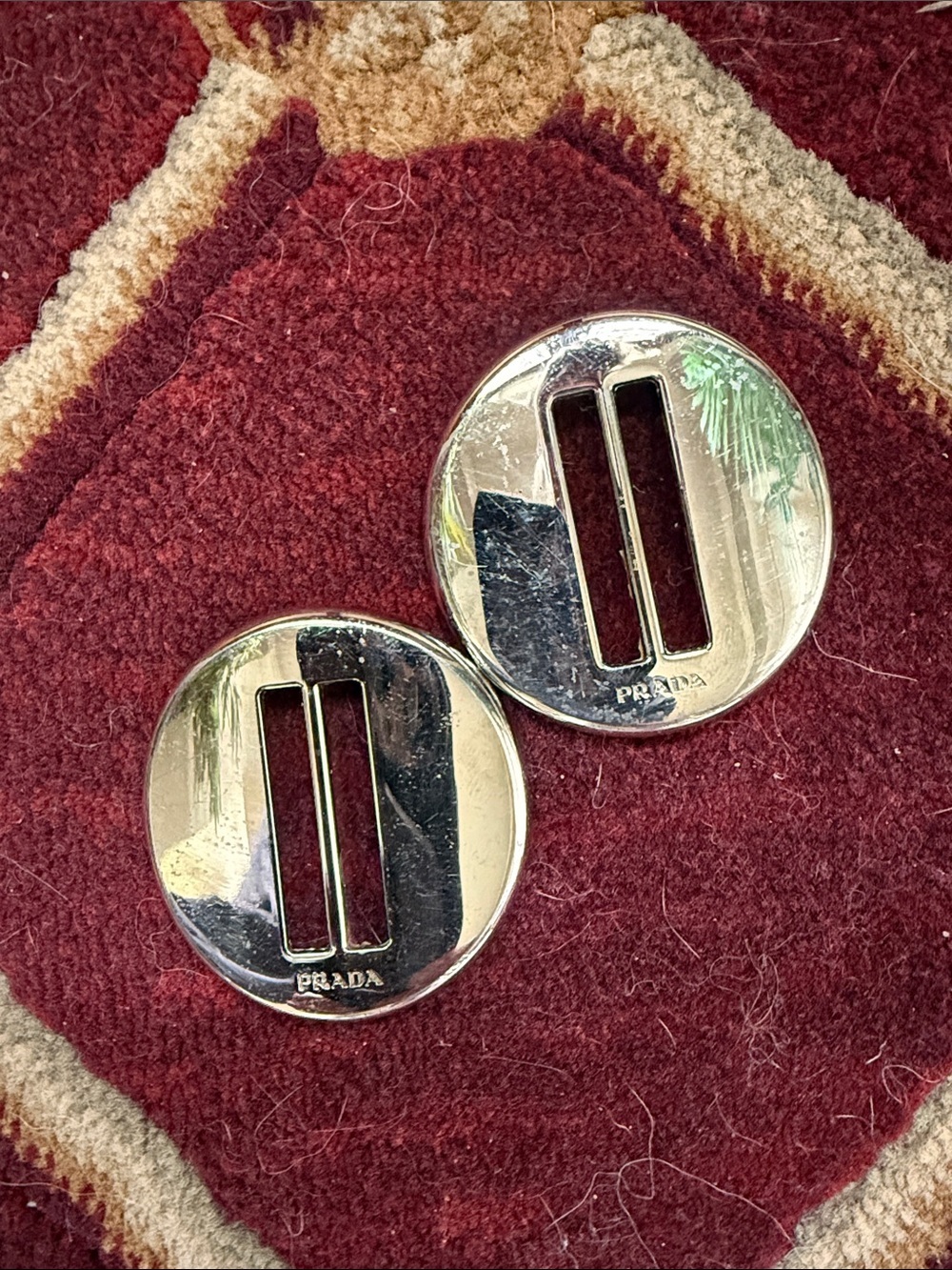 PRADA silver toned buckles 2” x 2”